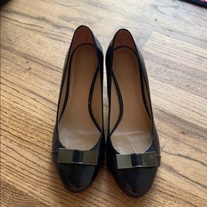 Dark blue patent wedges